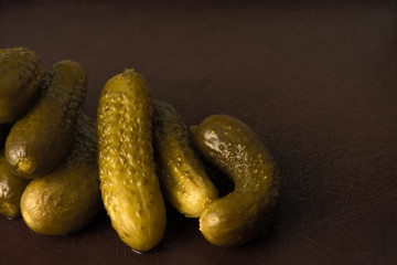 A group of pickled cucumbers for a food design with space for text