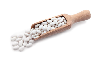 Wooden scoop with butter beans on white background