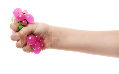 Female hand with stress ball on white background