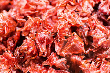 Organic Dried Hibiscus Flower Background. Stack of Candied Hibiscus Flower Close Up.