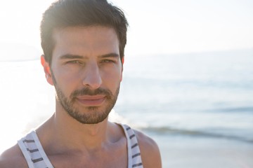 Portrait of young man at beach
