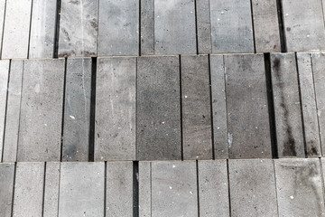 Texture of concrete slabs of a modern building wall