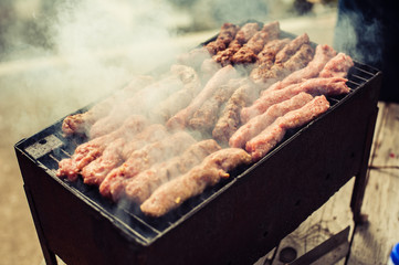 Obraz na płótnie Canvas BBQ. Closeup of barbecue grilling picnic in backyard outdoor