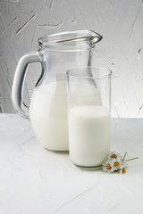 Milk jug and glass milk - healthy lifestyle concept