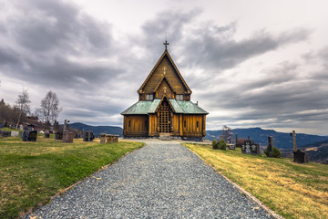 Fototapeta na wymiar Reinli, Norway - May 13, 2017: Stave Church of Reinli, Norway