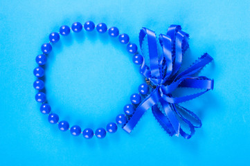 Beads on a bright background. Top view