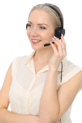 Fototapeta premium Call center operator or young beautiful business woman in headset isolated over white background 
