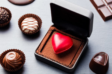 Heart shaped chocolate candy in a gift box.