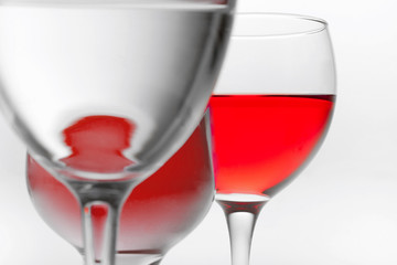 three glasses of red wine on it is white background and and place for text background