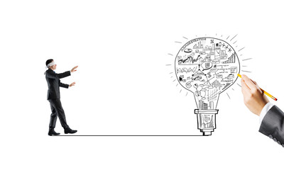 Concept of risk and difficulty with blind businessman steping carefully