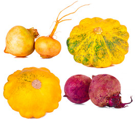 vitamin set of vegetables from the  large turnip, beets, zucchini orange and yellow with green sprigs of fresh isolated on white background