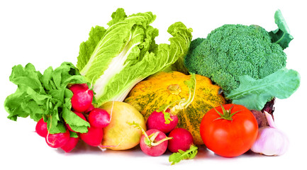 vitamin set of vegetables from the large turnip, beets, zucchini orange and yellow with green sprigs radish bright and fresh green salad leaves of fresh, tomato, garlic, isolated on white background