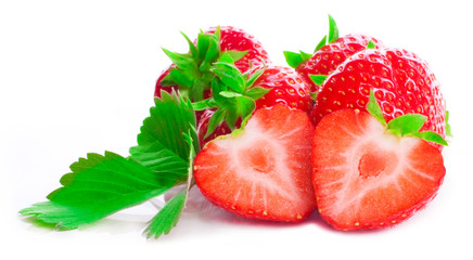 Sweet couple of red fresh strawberries with green tails with with green leaflets reflection and shades isolated on a white background