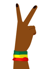 Hand of african woman wearing a flag of Ethiopia showing victory sign