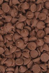 Dark milk chocolate chips background
