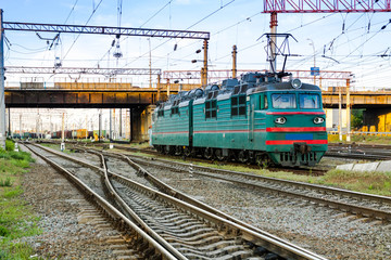 Fototapeta na wymiar Electric locomotive. Railway. A train. Electric locomotive of Soviet times.