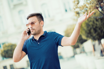 Close up of a man using smart phone