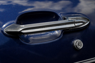Close view of a classic car door handle