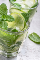 Mojito cocktail on light gray background