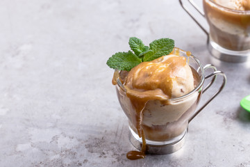 Cold brew iced coffee with caramel sauce