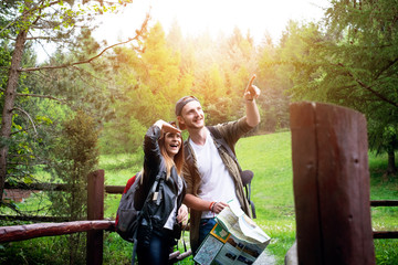 Young couple traveling in a nature. Happy people. Travel lifestyle 