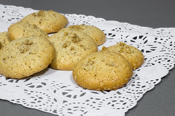 Homemade healthy nuts cookies on white napkin. Selective focus.