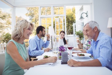 Group of friends interacting with each other 