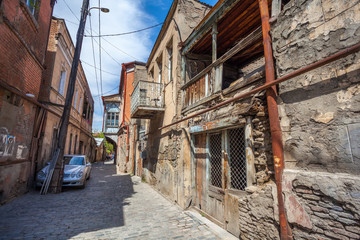 Fototapeta na wymiar Traditional old balcony of house in Tbilisi. Georgia 07.05.2017