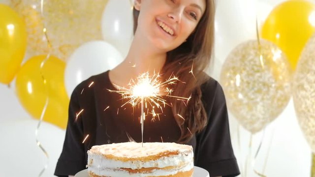 Birthday. Girls with a cake with candles. 1080p fullHD.
