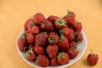 Organic strawberries on a plate