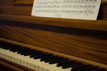 Fototapeta na wymiar Close up of piano and sheet music
