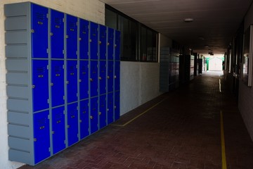 Blue lockers in corridor