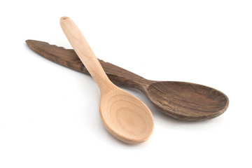 Old wooden spoon on a white background