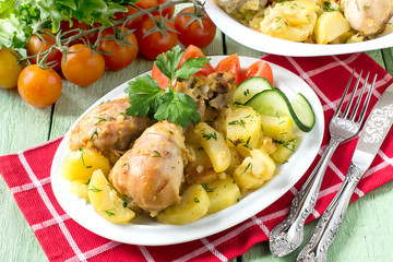 Chicken drumsticks, baked with potatoes