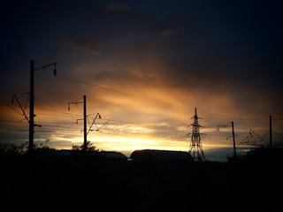 Railroad freight cars. Beautiful sunrise.