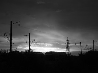 Railroad freight cars at dawn. Old filter.