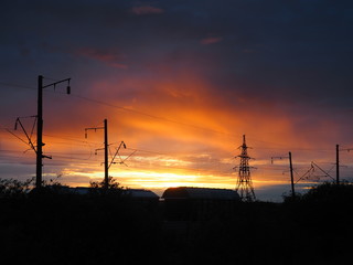 Railroad freight cars. Beautiful sunrise.