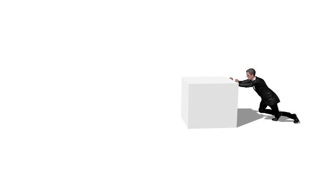 Businessman pushing a heavy box
