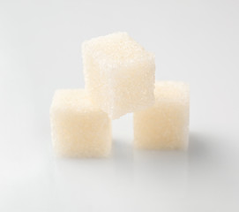 Sugar cubes on white background