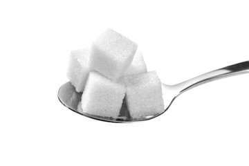 Sugar cubes in spoon on white background