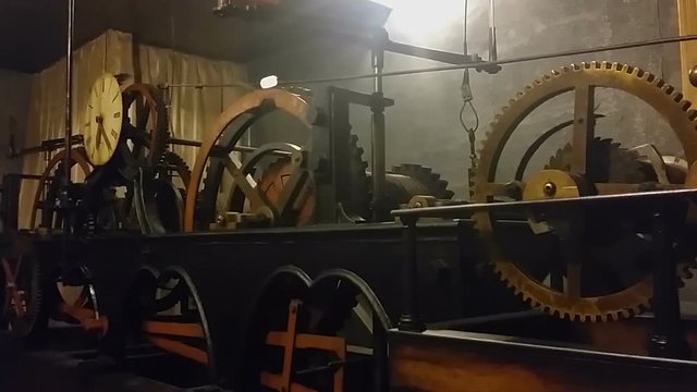 Ancient clock mechanism measuring time at Lviv City Hall, technical progress
