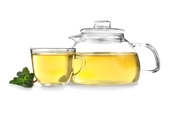 Teapot and cup of tea on white background