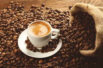 Cup of coffee and bag on beans