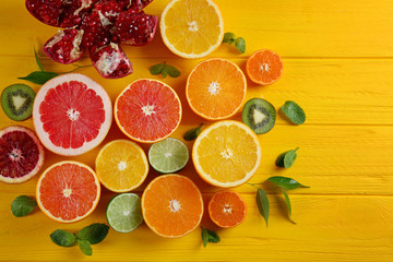Beautiful composition with fresh fruits on wooden background