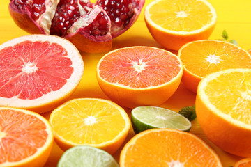 Beautiful composition with citrus fruits on wooden background