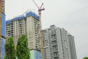 Obraz na płótnie Canvas high rise condominium buildings construction site.