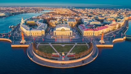 Obraz premium Spit of Vasilyevsky Island. St. Petersburg. Neva River. Summer view of Petersburg. Exchange. Rastral columns. The Cabinet of Curiosities. The Palace Bridge.