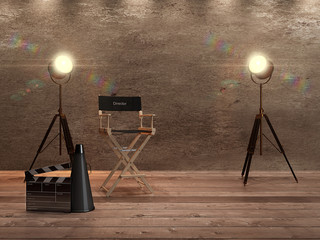 Film director's chair with megaphone and spotlights shining