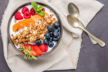 Yogurt with baked granola and berries