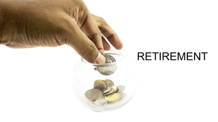 Money in the bottle with RETIREMENT alphabet letters. Saving concept